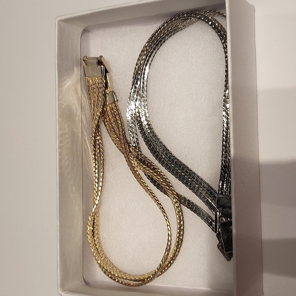 Set of 2 triple strand fashion bracelets in silver and gold